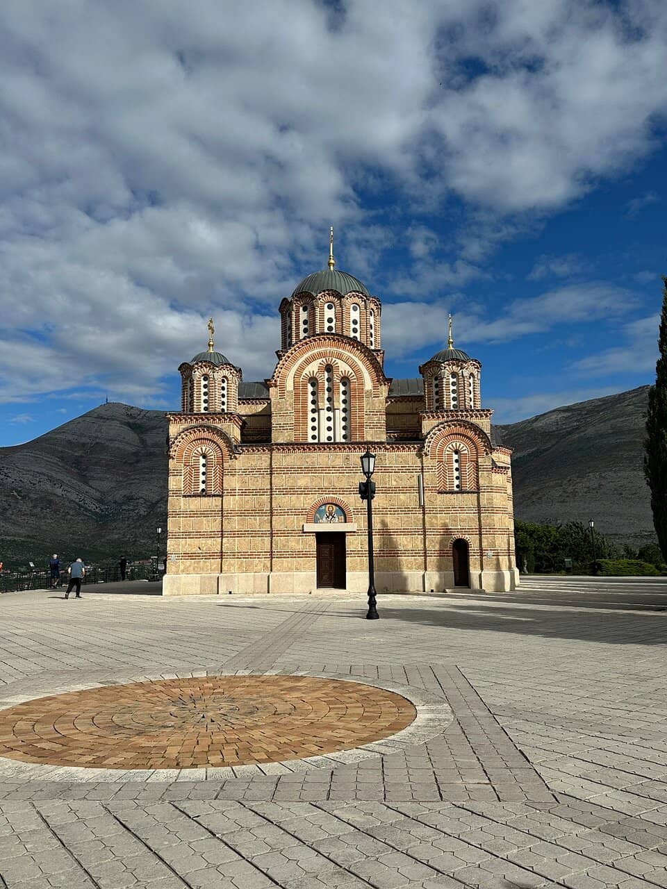 Vivid Frescoes & Gilded Altar