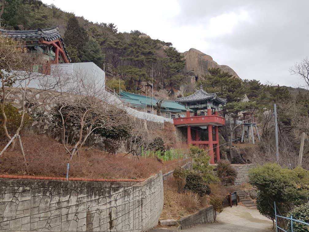 Cliffside Buddha Carvings