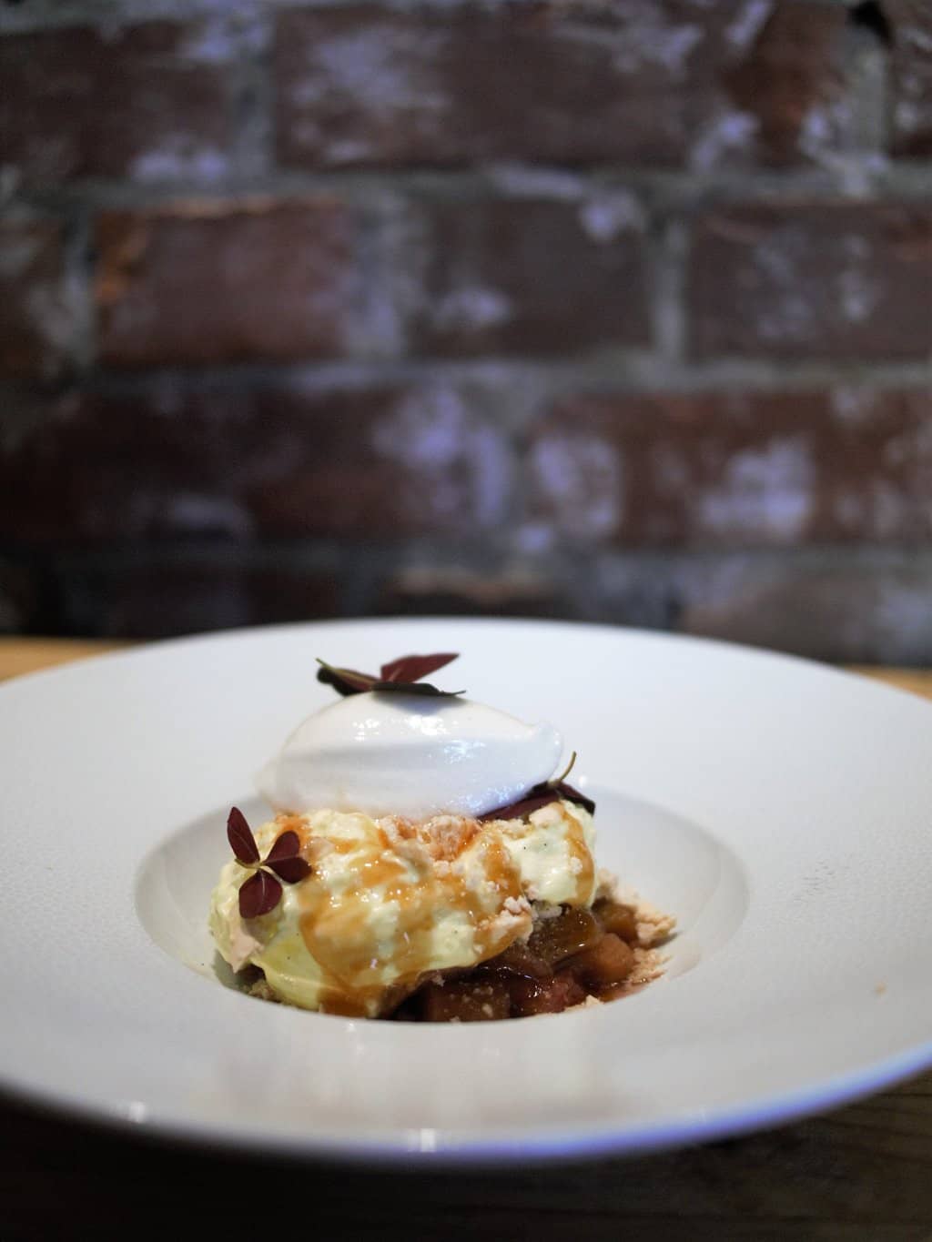 Rhubarb compote with vanilla espuma and gooseberry sorbet