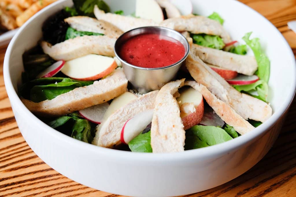 The Mirage Salad with grilled chicken and raspberry vinaigrette