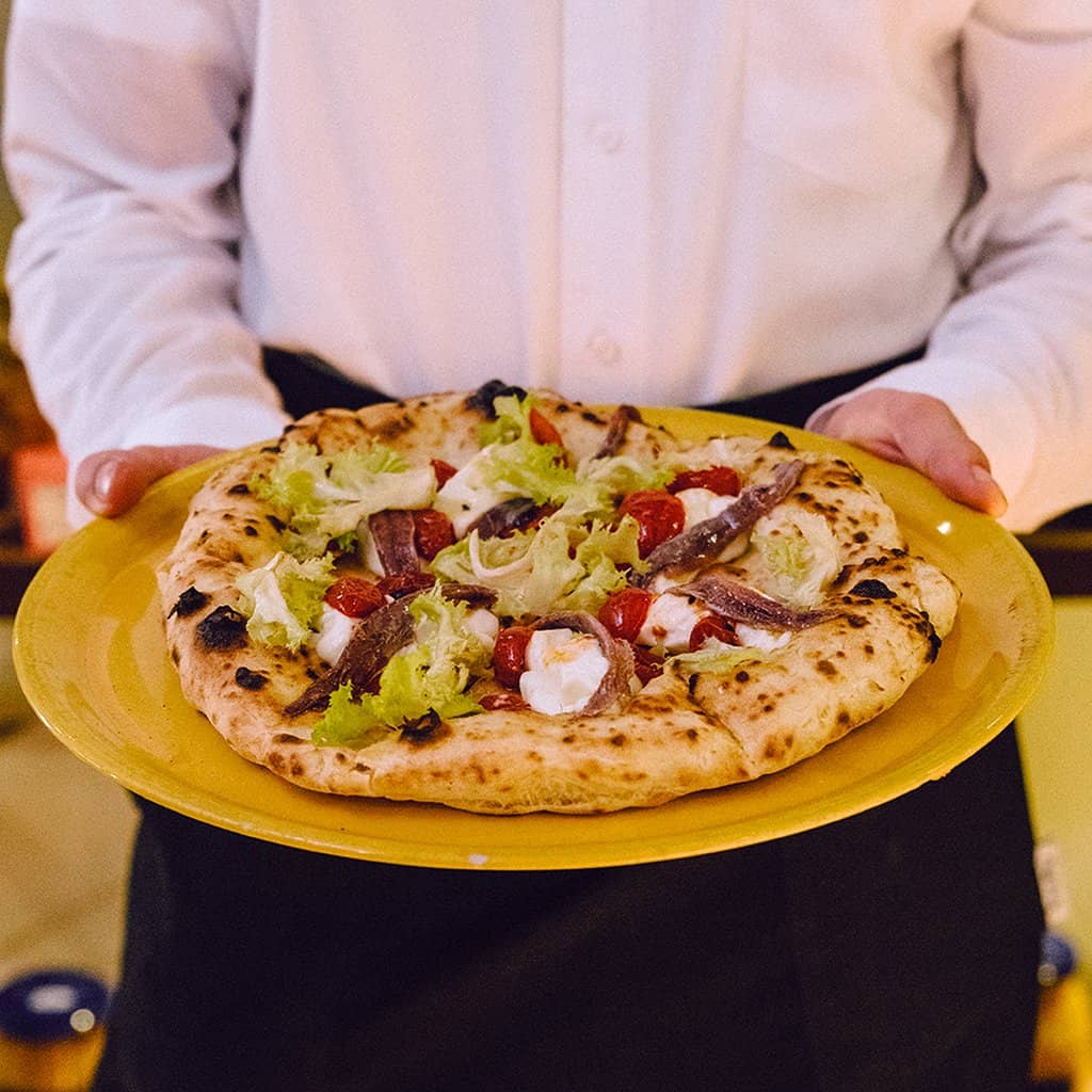 Pizza with Anchovies and Tomatoes