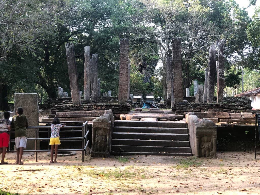 Ancient Stupa and Buddha Statue