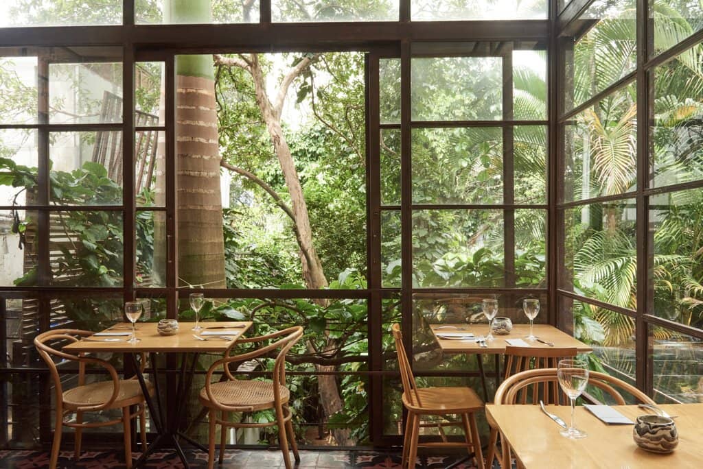 Lush, Stylish Greenhouse Ambiance
