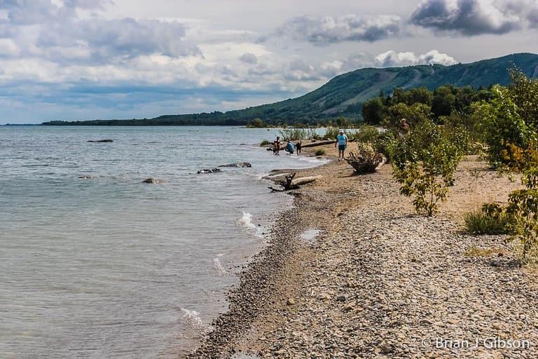 Beautiful walk along the stoney beach with a nice view of the escarpment. hills