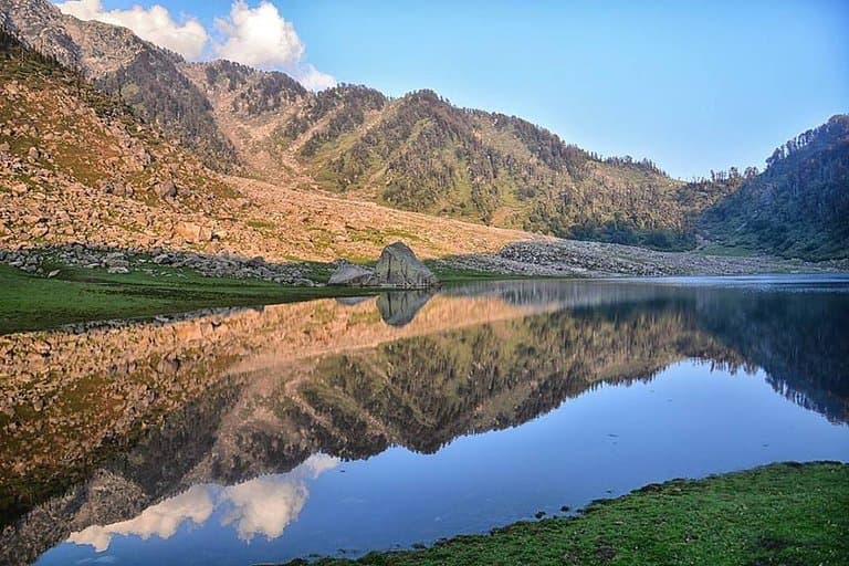 Kareri Lake is a beautiful lake lap of the Dhauladhar mountain range of Himachal Pradesh