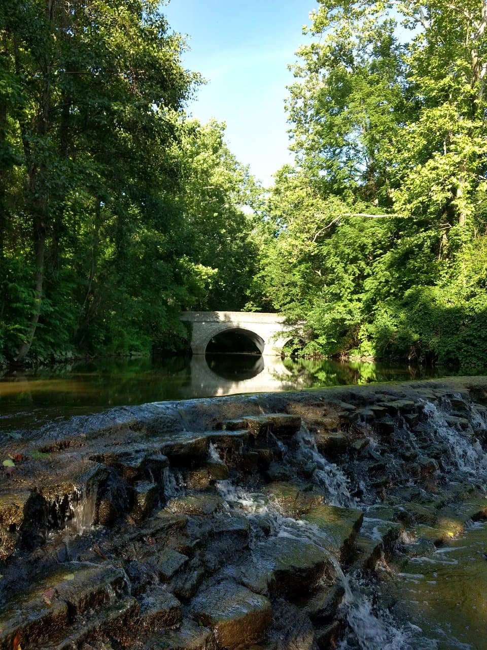 the waterfall and nearby bridge