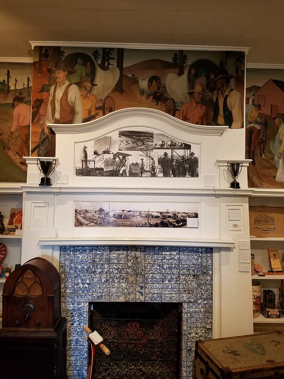 This is just part of our 1934 James Douthitt Wilson mural located in our museum. We are located in Tyler's historic Carnegie Library building and this mural is still in the location it was intended to be. This mural was part of the PWAP (Public Works of Art Program).