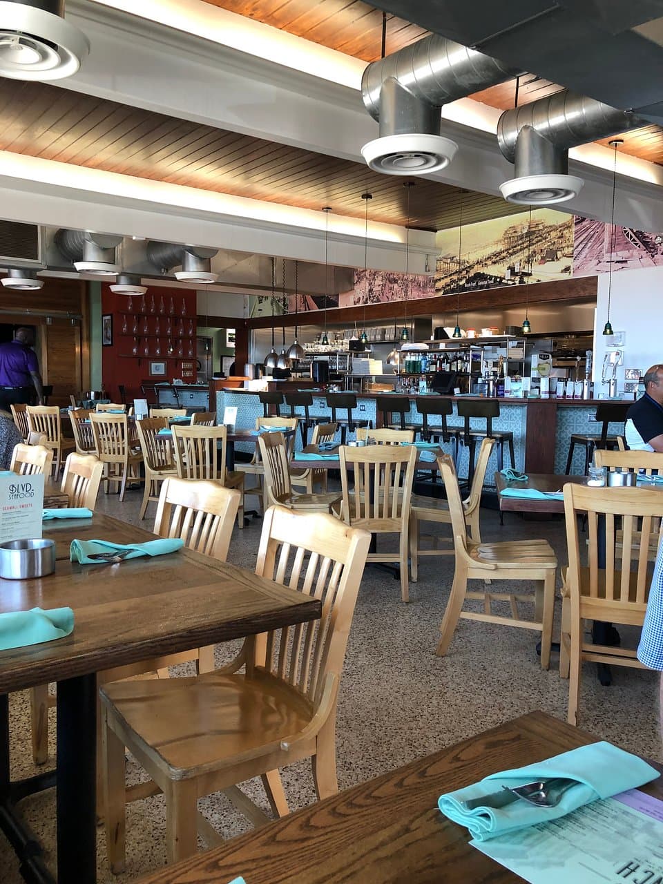 Lots of tables, booths and bar seating along with a private dining area