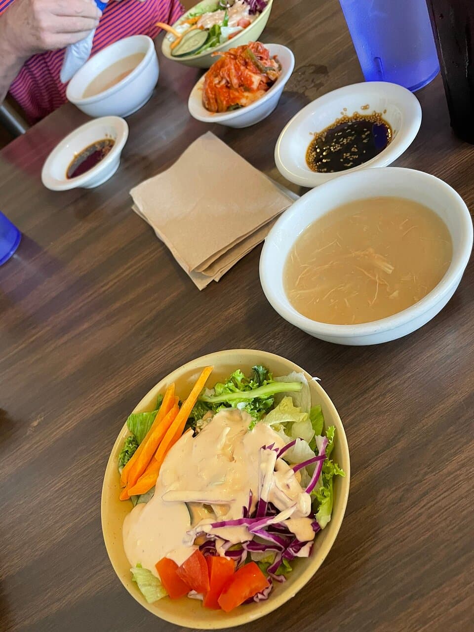 Soup and salad included with meals. Beef bulgogi, spicy pork bulgogi. Simple, not fancy restaurant, but the service and food are excellent. We will be back!