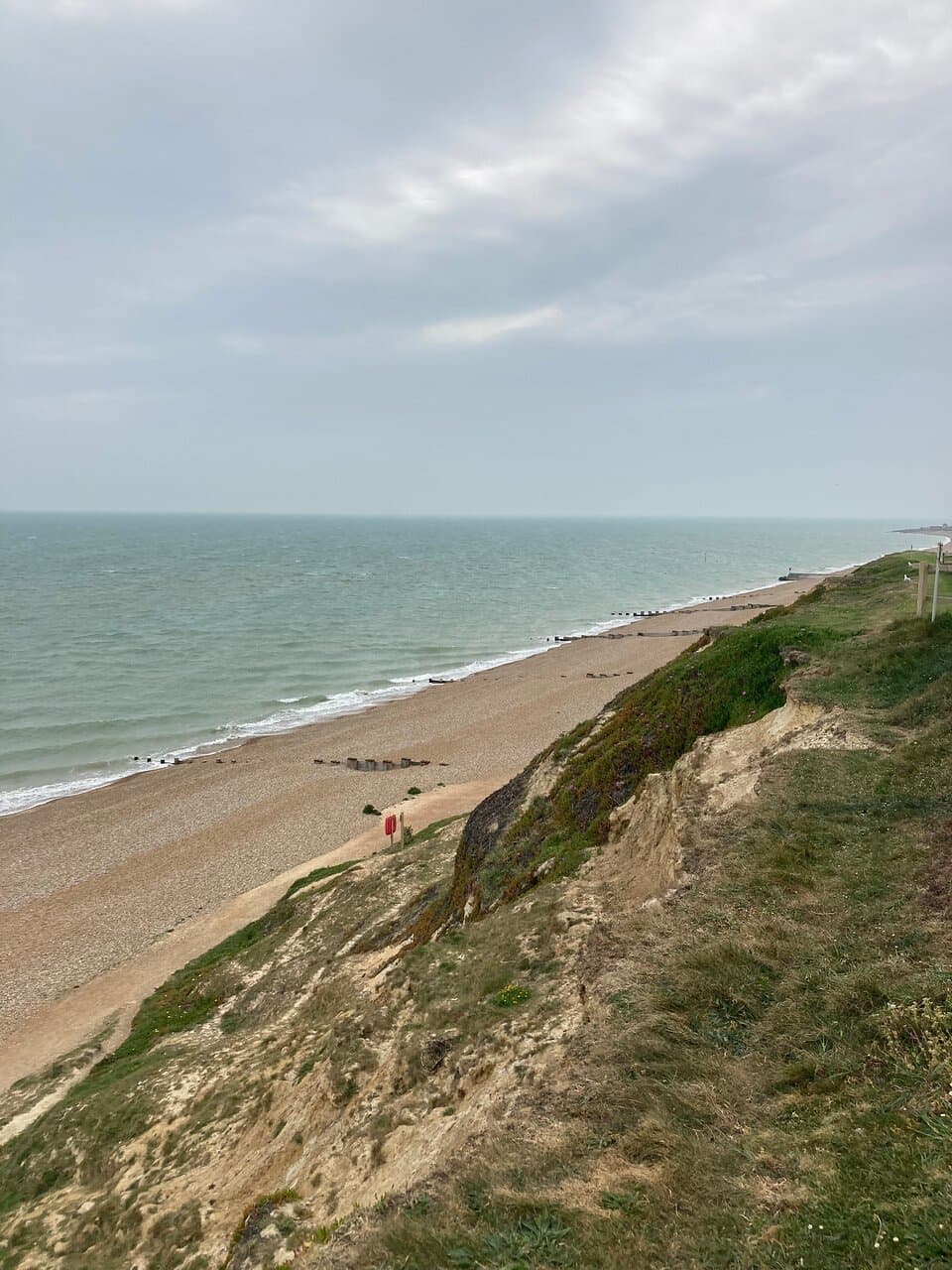 18.  Glyne Gap Beach, Bexhill, East Sussex (May 2022);  view of the beach from Galley Hill looking towards Bexhill