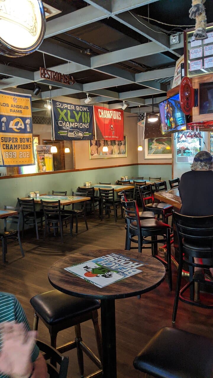 Empty Table and Chairs In Dollie's Pub & Café.