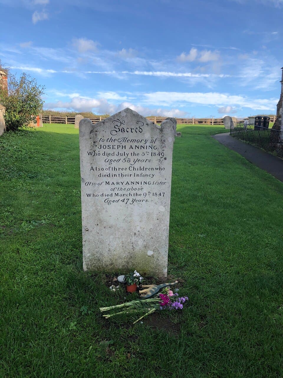 The grave is at St Michael’s church in the centre of the town. The grave stone of Mary Anning and her husband can be found on the left hand side of the path. The church will be on your right  Walking to the top of the graveyard there’s the most stunning views across Lyme Bay and the Jurassic coast as far as the eye can see. Worth a little look if you’re in the town.