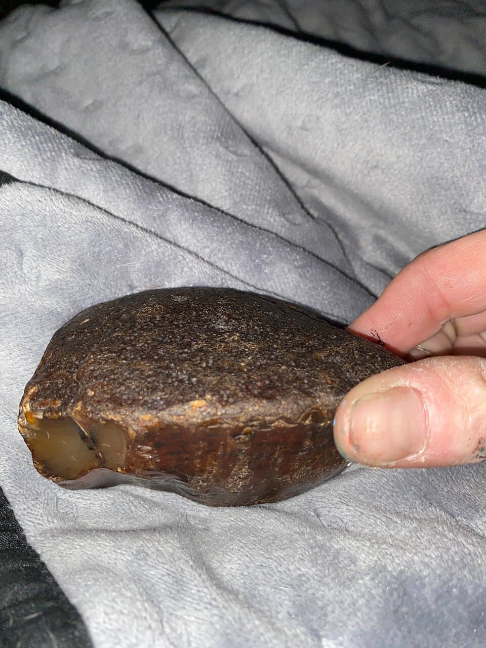 Could anyone tell me what this is I thought it was Amber and I thought it was a lunar meteorite????????