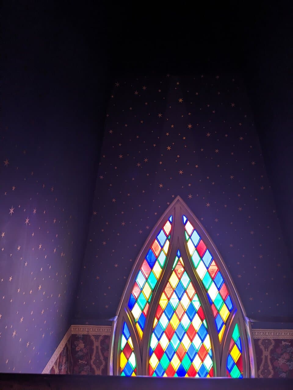 Stained glass above the balcony.