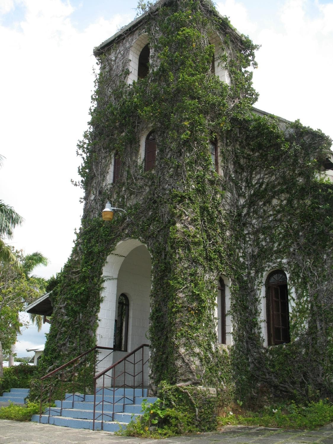 Ivy covered facade of Our Lady of Perpetual Help Church, St. Ann's Bay, Jamaica