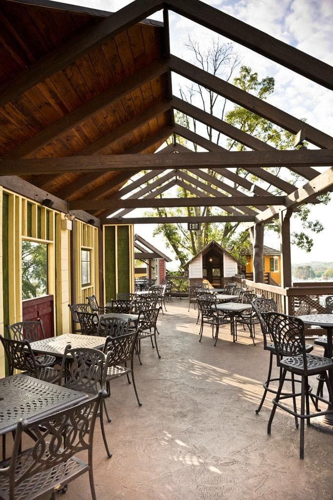Dine in our two story treehouse inspired patio.