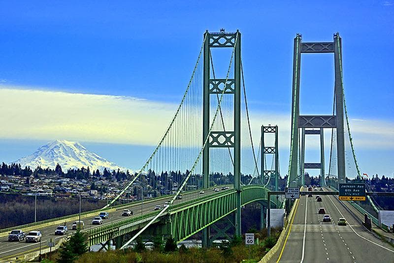 View of Tacoma Narrows Bridge of Mt Rainier from West side of bridge.