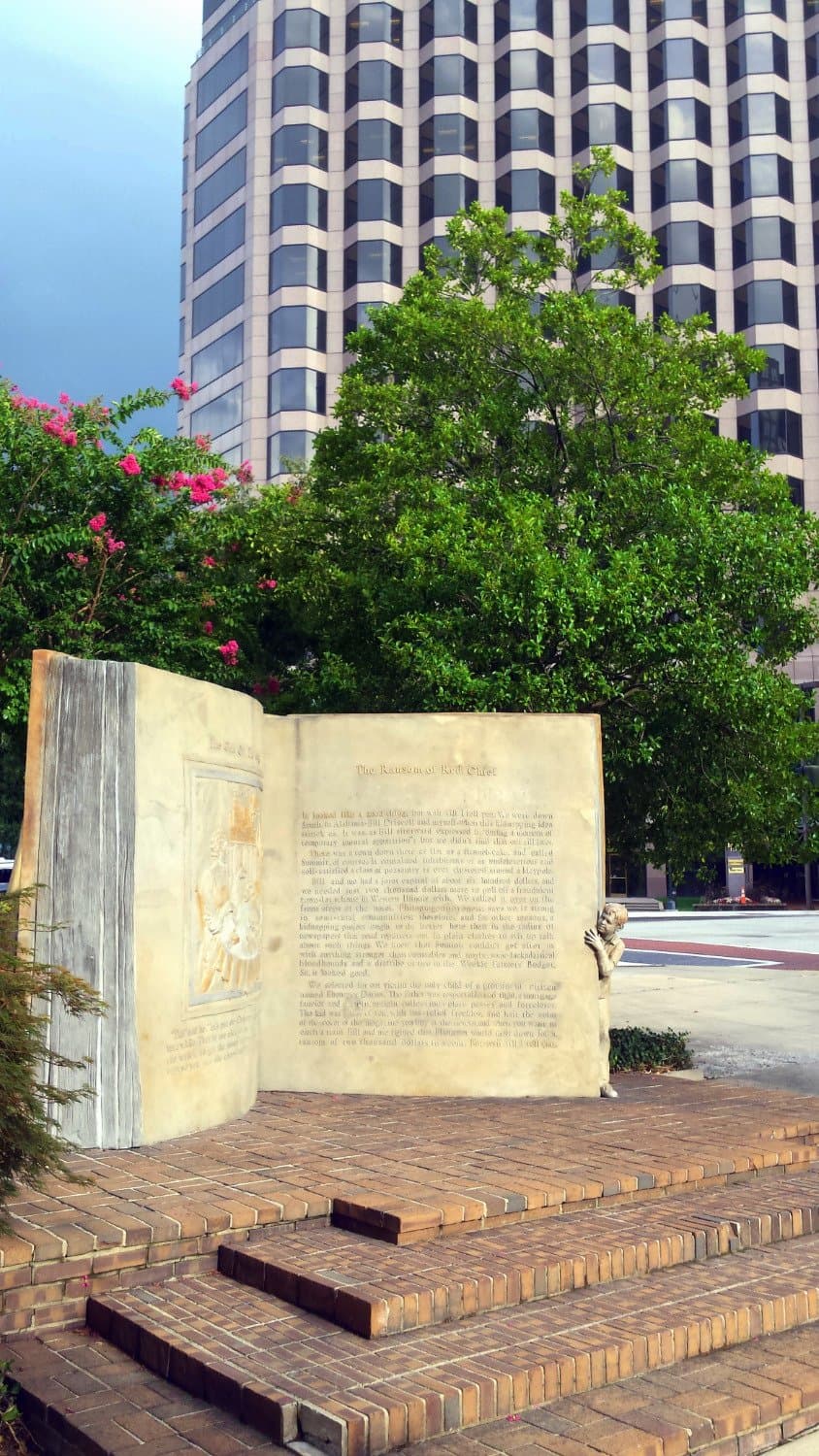 book statue and background