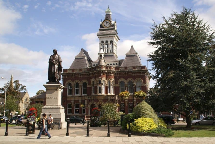 This is Grantham Guildhall Arts Centre , Theatre and Mayors Office ,and statue of Sir Isaac Newt
