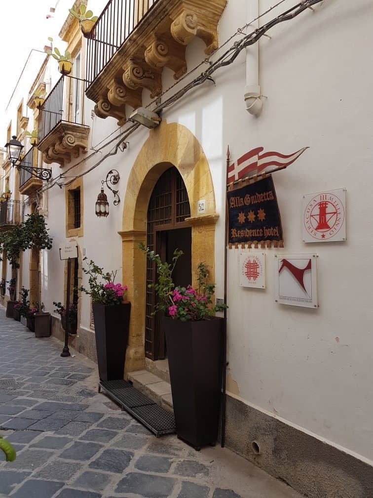 Hotel entrance, baths underneath