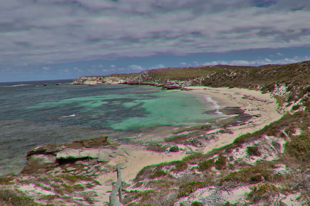 The dunes surround them