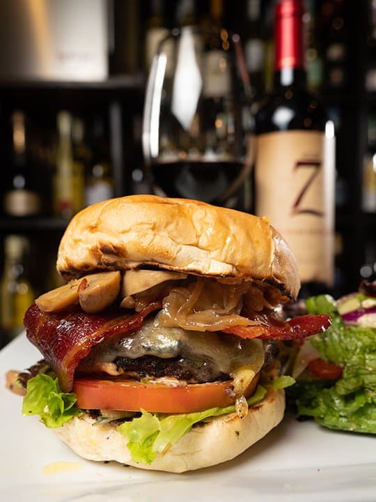 Our Taynia Burger - mushrooms, bacon, cheddar.