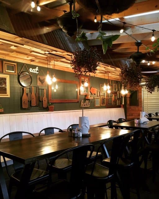 Covered Patio with green house vibes.