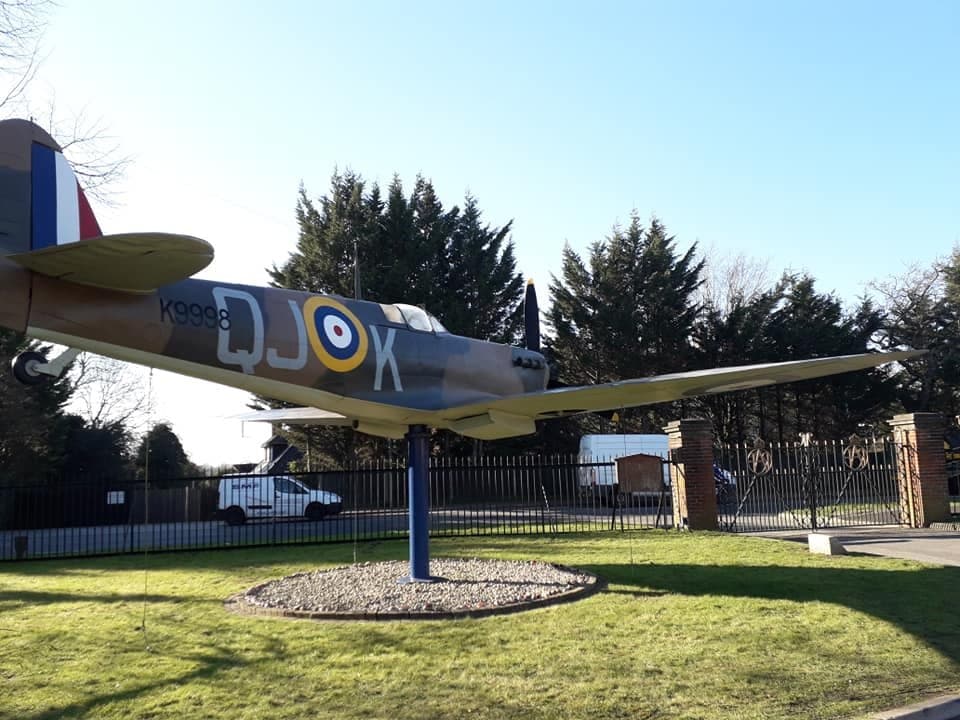Aircraft at entrance to Memorial Chapel