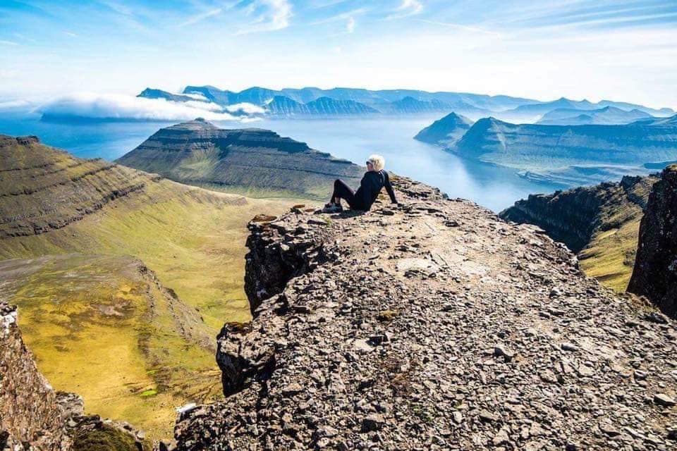 Hihgest mountain at 882 meters . From the plain on the top, there is a most wonderful view overlooking the entire country and down into the beautiful deep Ambadalur valley with Kalsoys characteristic countour in the backgrund.