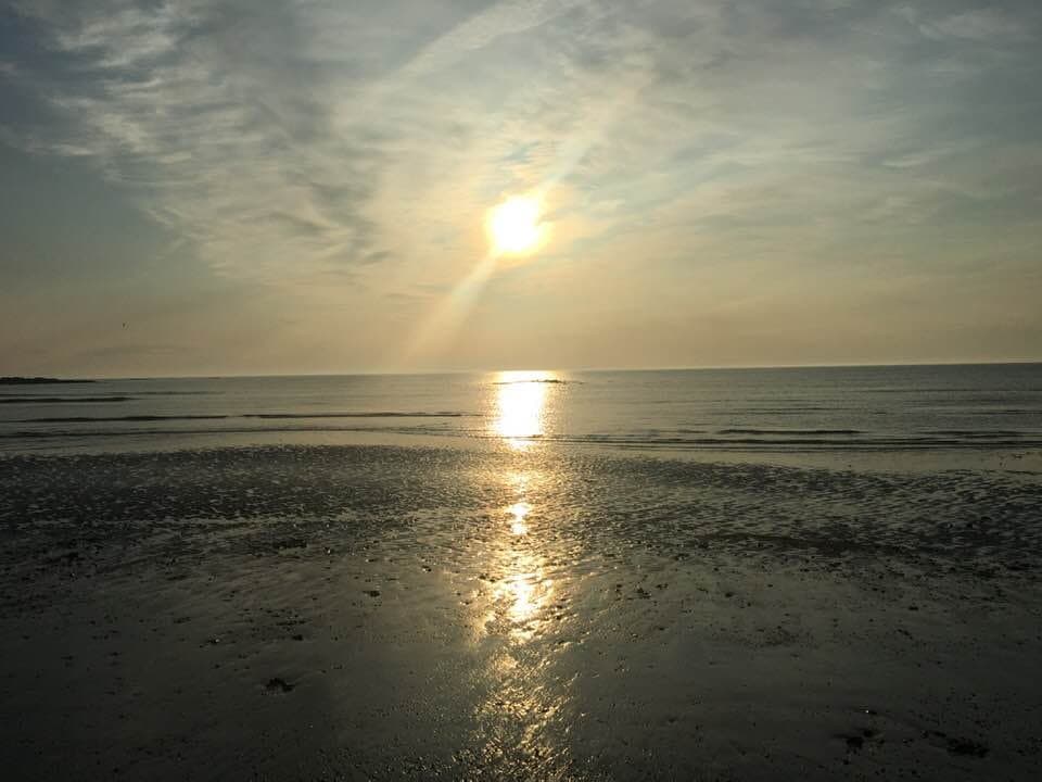 Seapoint Beach past sunrise.  No one else on beach - nice reflection at sunrise! 
