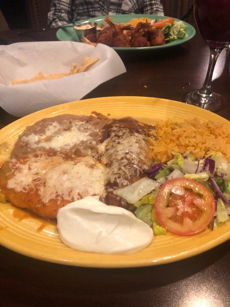 Chile Relleno and Enchilada, with rice, beans, sour ceram and a small salad