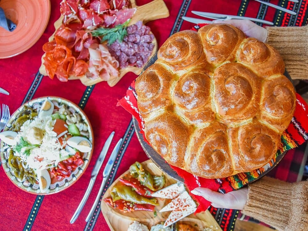 Homemade Bulgarian bread with salad, meat charcuterie and Babian Raziadka