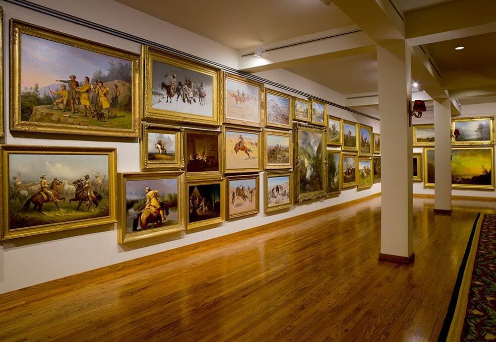 Installation view of the American Museum of Western Art – The Anschutz Collection. The artists and styles represented span nearly 200 years of American history and includes everything from early American portraiture by Rembrandt Peale and Charles Bird King to Hudson River School artists like Thomas Moran and Albert Bierstadt. 