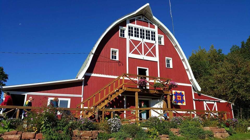 Our historic barn was built in the 1920s as a mail order barn from Sears Roebuck Co. It was shipped by train, hauled up the hill from Bayfield by horse-drawn wagons, and assembled by local carpenters. The barn originally cost $896.00.

It rises 600 feet above, and about two and a half miles from, Lake Superior. In the hayloft, you’ll find a panoramic view of Lake Superior and the Apostle Islands. So bring your camera and binoculars and discover how we got our name: Superior View.