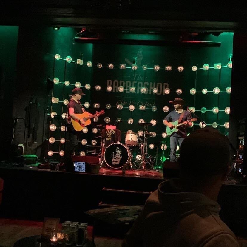 Enjoy a Drink at The Barbershop Cuts & Cocktails