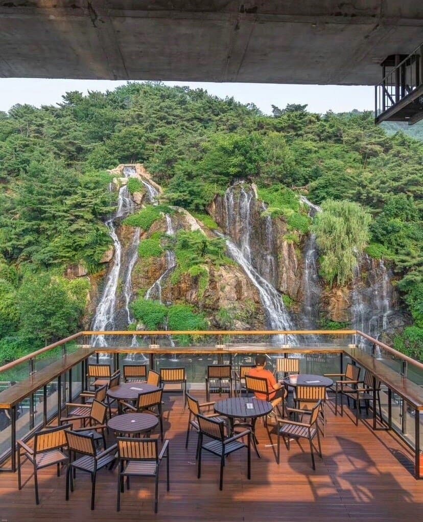 Cafe overlooking the cascading waterfall in Seoul