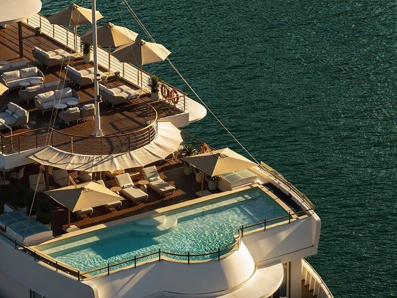 As Vietnam’s leading wellness and boutique luxury cruise, Bhaya Soul pioneers the art of mindful travel on the tranquil waters of Ha Long Bay & Lan Ha Bay. With only 20 meticulously curated cabins, this intimate vessel glides gracefully among the Bay’s legendary limestone towers, offering a sanctuary where luxury meets serenity. Here, wellness flows through every detail, from sunrise meditations to nature-inspired therapies, inviting you to slow down, breathe deeply, and rediscover balance.