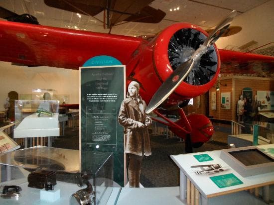Amelia Earhart and Bessy her plane
