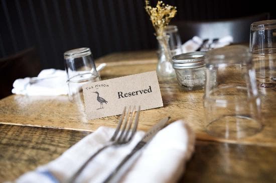 repurposed wood tables by local artist