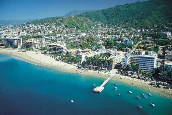 Aerial view of Los Muertos Beach and the old pier.
