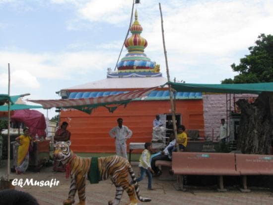 Behind the temple.