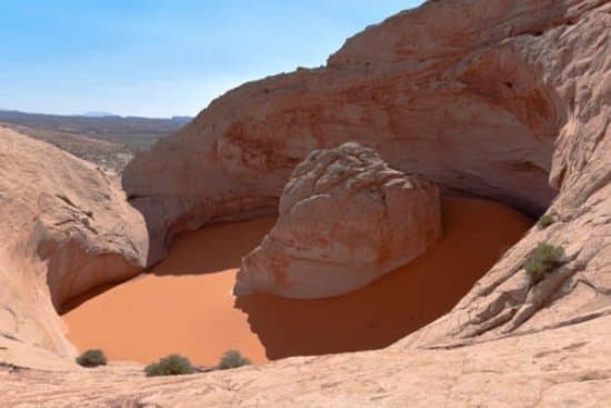Cosmic Ashtray also known as the "volcano." What looks like dirty water is orange sand