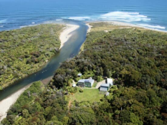 The Waitutu Forest Lodge is magnificently situated at the gateway to Fiordland National Park in the South Island of New Zealand. The fast flowing Wairaurahiri River borders the Lodge on the east as well as the wild south coast five minutes to the south. The Waitutu Forest surrounds the Lodge and offers guests a magical experience of wondering amongst a world renowned ancient Podocarp forest.