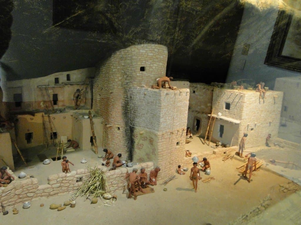 Exhibit with puebloans going about their day