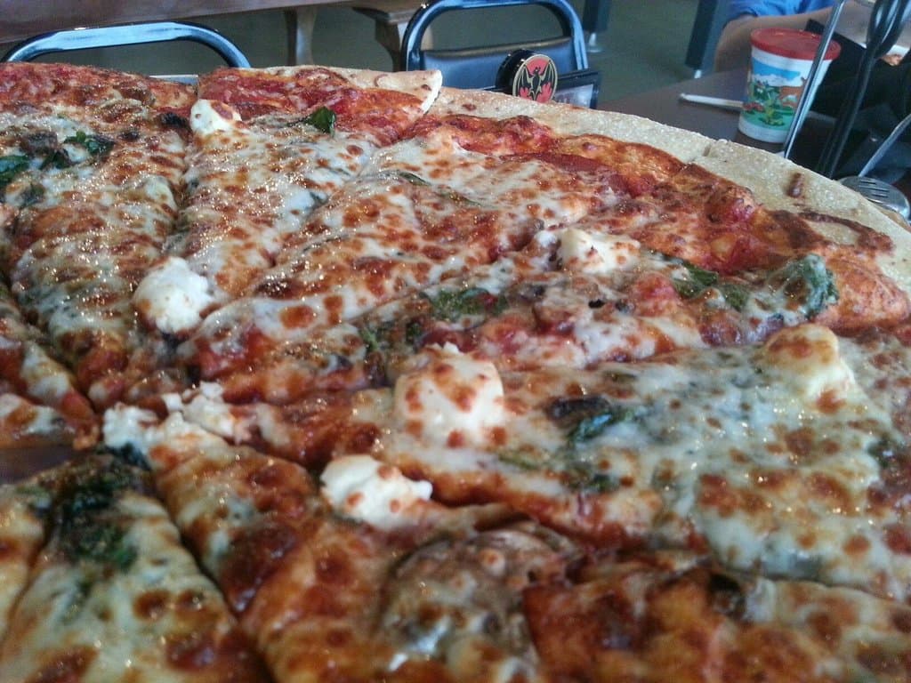 Popeye-roni Pizza (pepperoni,  cream cheese, spinach, mushrooms)