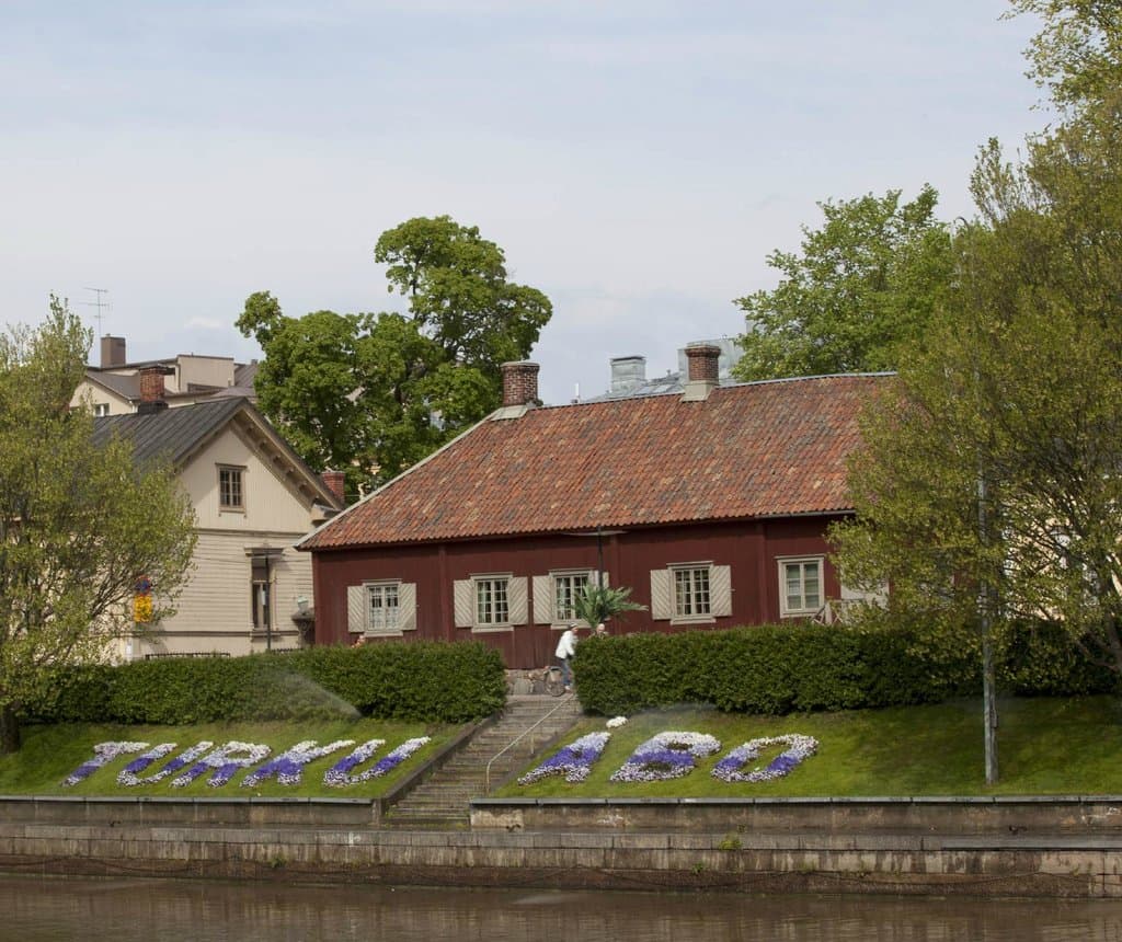 The Qwensel House as seen from the east bank.