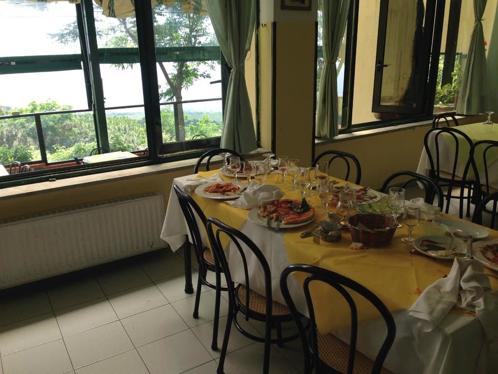 Ristorante Douce Atmosphere, great food and phenomenal mountain-side view of the sea.