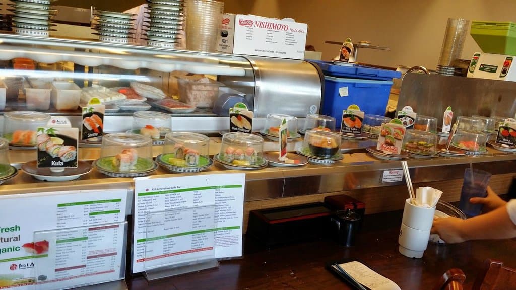 Kula Revolving Sushi Bar.  Pick and choose as food comes to you.s