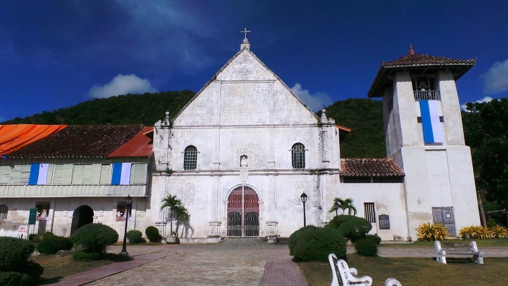 The imposing Patrocinio de Maria Church of Boljoon facing the sea