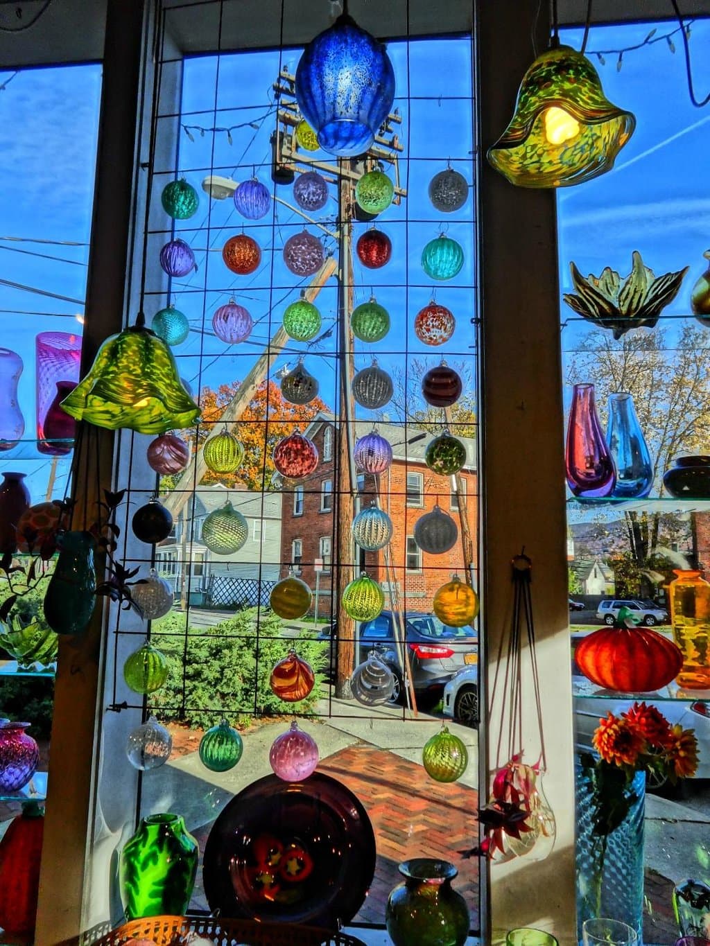 Window full of sample ornaments.